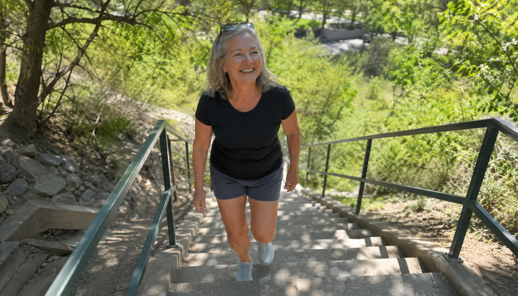 Active woman over 55 on the stairs